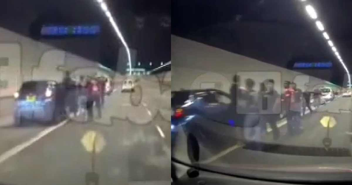 GROUP STOPS THEIR VEHICLES INSIDE TUNNEL TO CONFRONT EACH OTHER