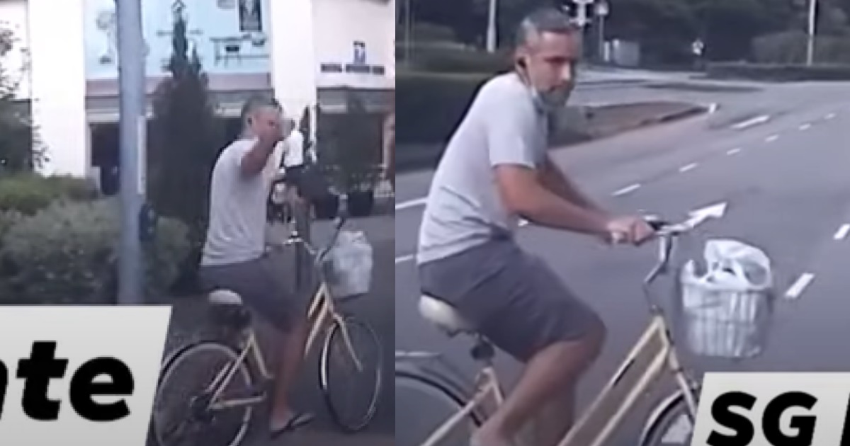 ANG MO CYCLIST SHOWS FINGER AFTER CROSSING 4 LANES WHILE IGNORING RED LIGHT
