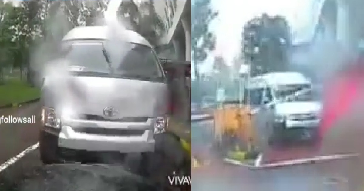 VAN TRIES TO TAILGATE CAR OUT OF CARPARK GANTRY, FAILS EPICLY