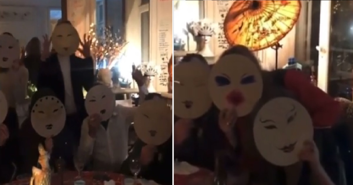 ANG MOHS THROW PARTY, HOLD MASKS WITH SLANTED EYES AND SHOUT: “WUHAN GIRLS!”