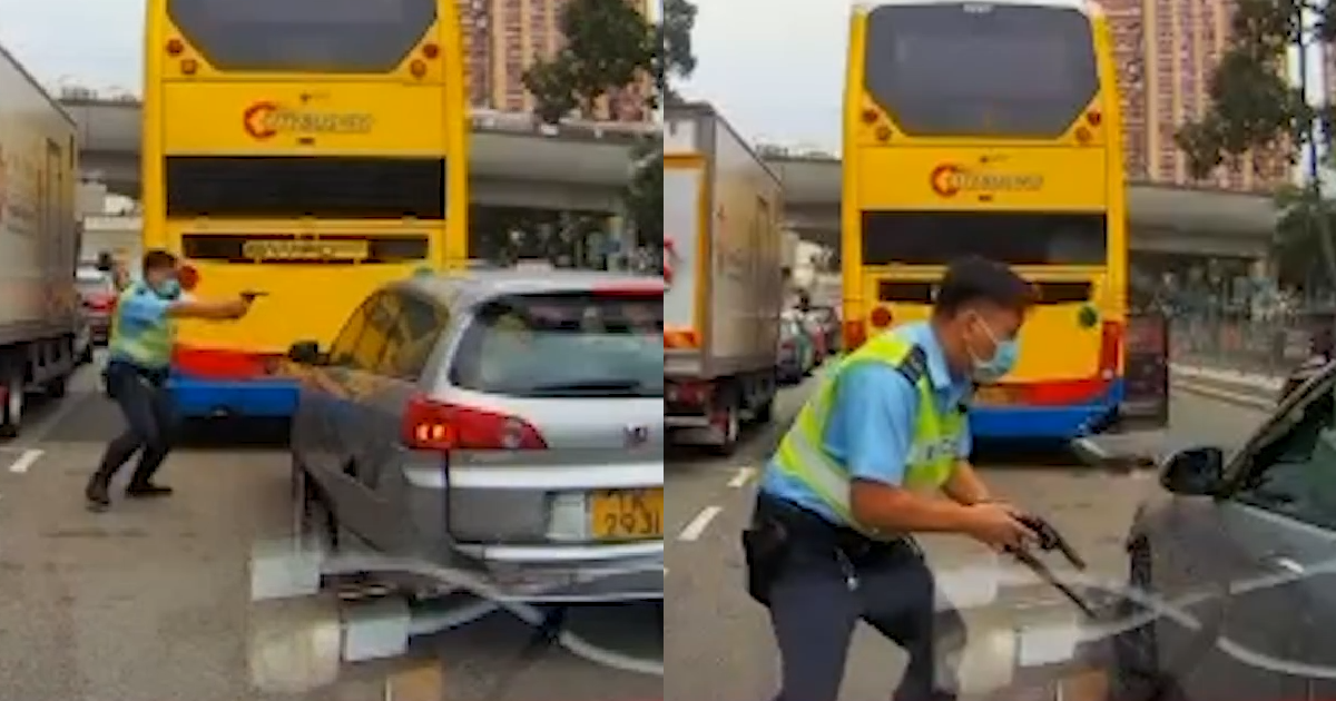 TRAFFIC OFFICER FIRES GUN AT GANGSTER’S CAR AFTER WILD CAR CHASE IN HK