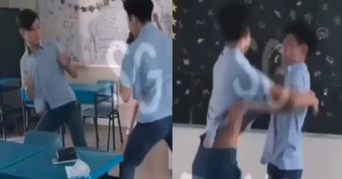 YOUNG PUNKS FIGHTING INSIDE CLASSROOM, BUT LOOK LIKE THEY FONDLING EACH OTHER
