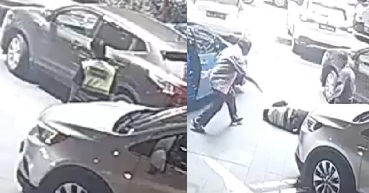 SECURITY GUARD CONTROLLING TRAFFIC KENA BANG BY CAR