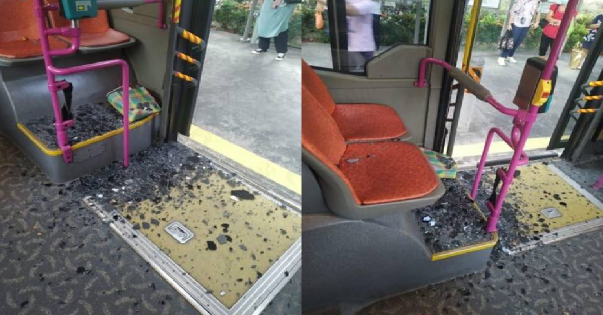 BUS GLASS DOOR SHATTERED AT BEDOK TRAFFIC LIGHT