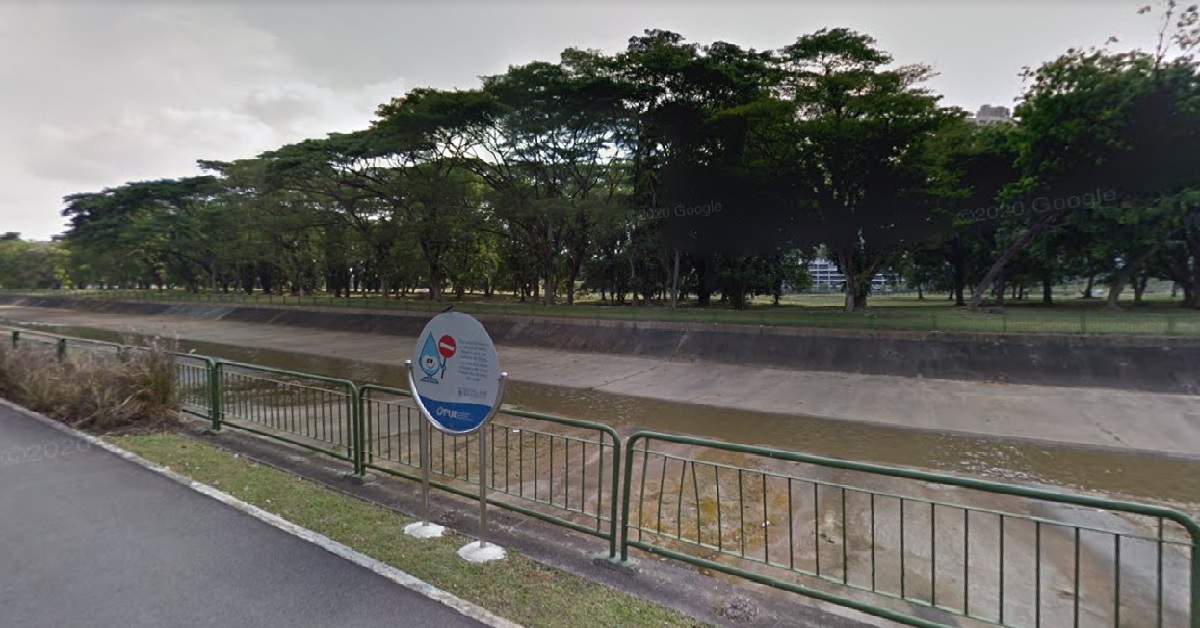 FAMILY OF 4 WALKING THEIR DOG IN CHOA CHU KANG WATER CANAL