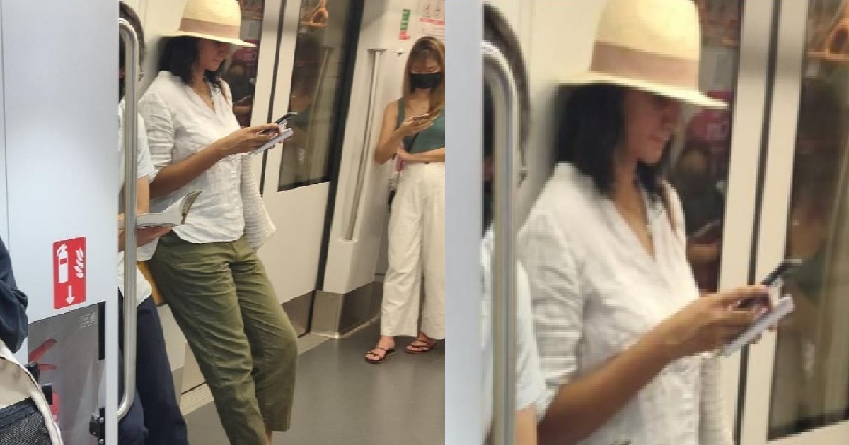 WOMAN INSIDE MRT NEVER WEAR MASK BECAUSE COVID-19 CANNOT SEE HER UNDER HER HAT