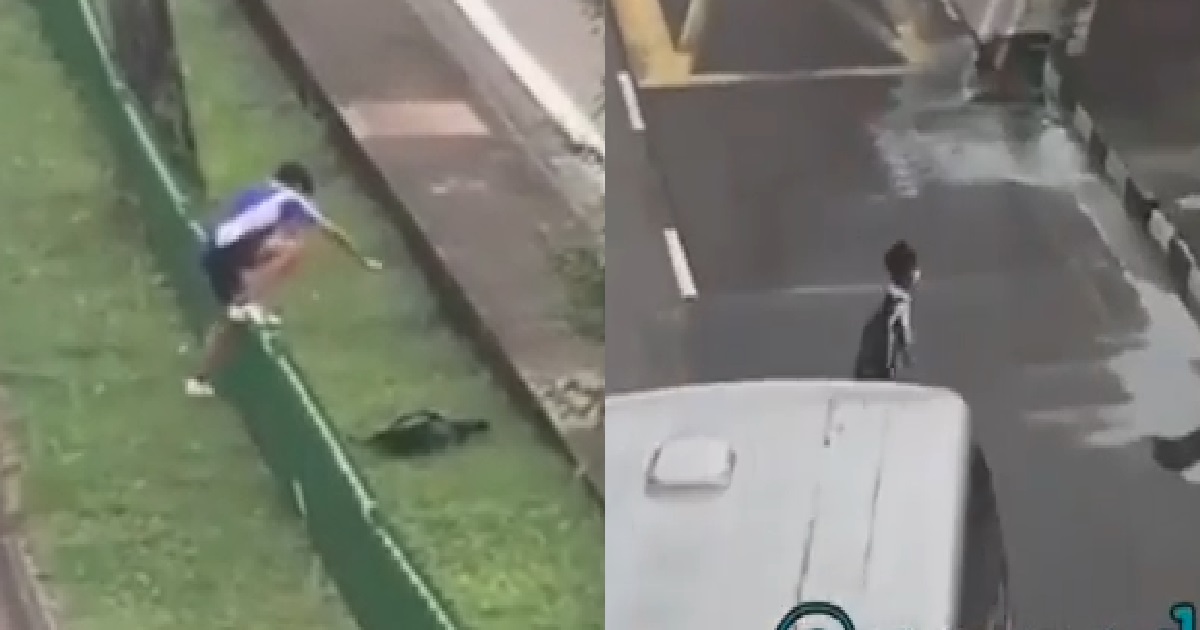 YOUNG PUNK JAYWALKING, GOES THROUGH OBSTACLE COURSE IN THE MIDDLE OF ROAD