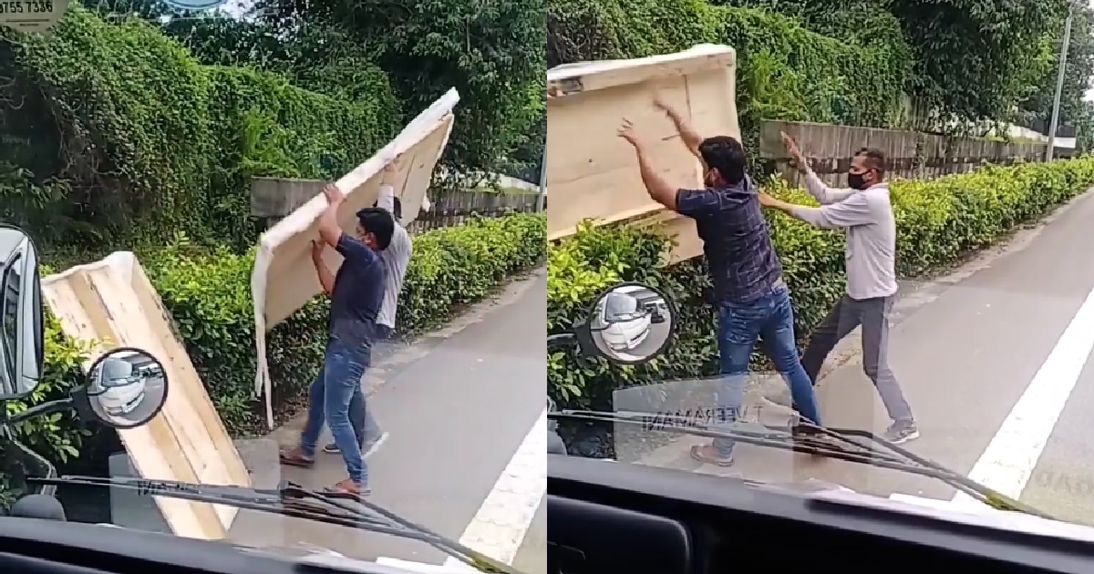 KIND HEARTED FOREIGN WORKERS CLEAR RUBBISH OBSTRUCTING EXPRESSWAY