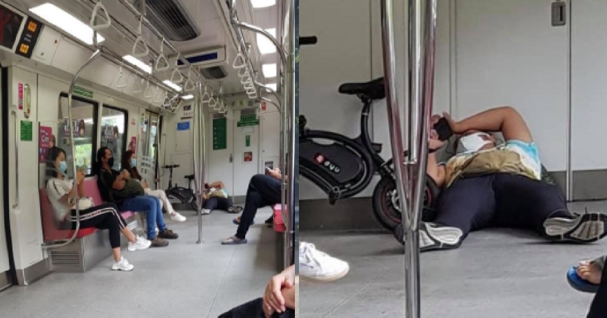 GUY LYING DOWN ON MRT FLOOR TO USE PHONE, SUPER SHIOK!