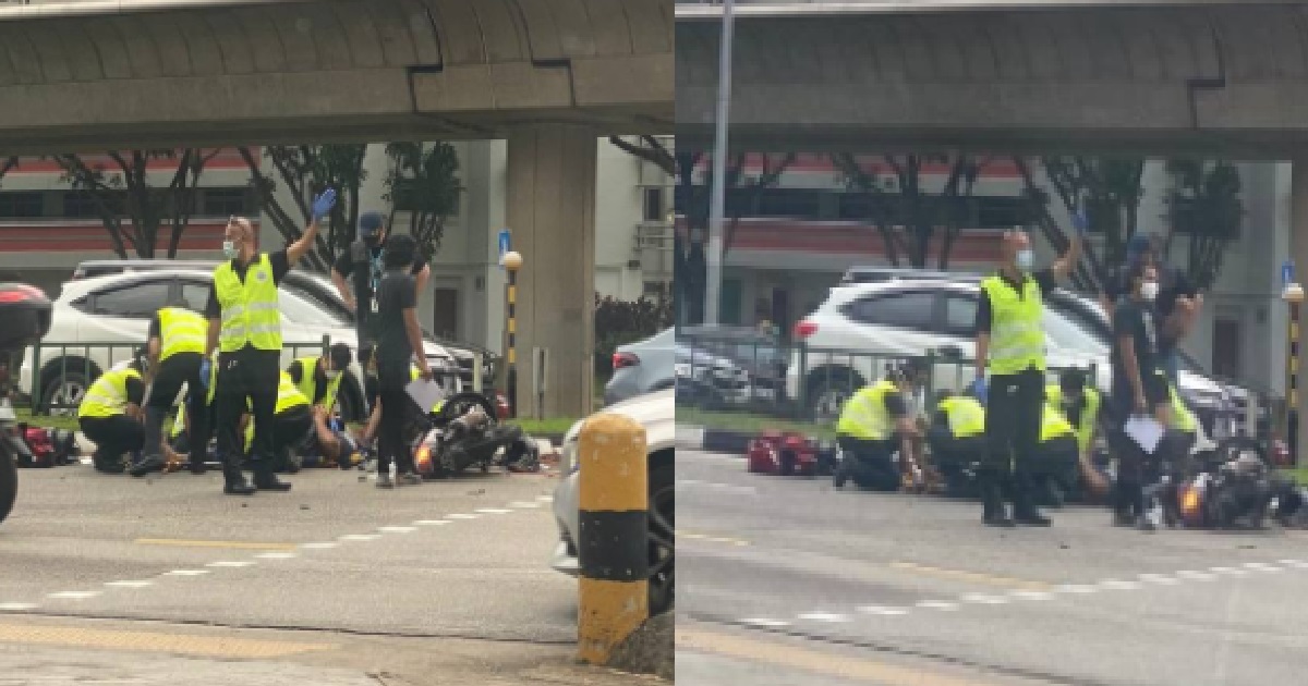 ACCIDENT AT WOODLANDS, PARAMEDICS TRYING TO RESUSCITATE FALLEN MOTORIST