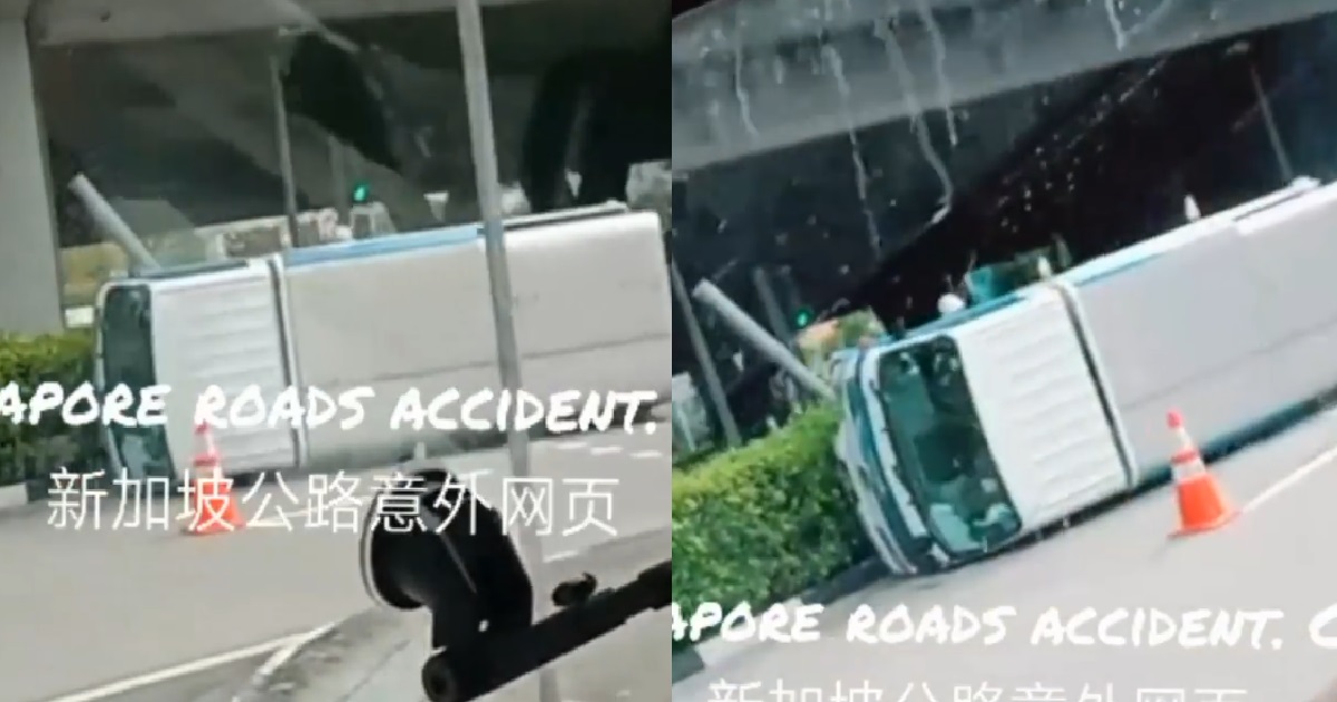LORRY FLIPPED ON ITS SIDE, KNOCK DOWN TRAFFIC LIGHT
