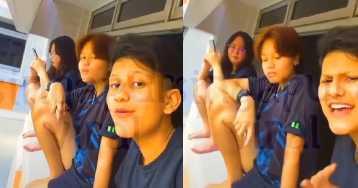 YPS SITTING ON WINDOW LEDGE TO TAKE VIDEO OF THEMSELVES SINGING