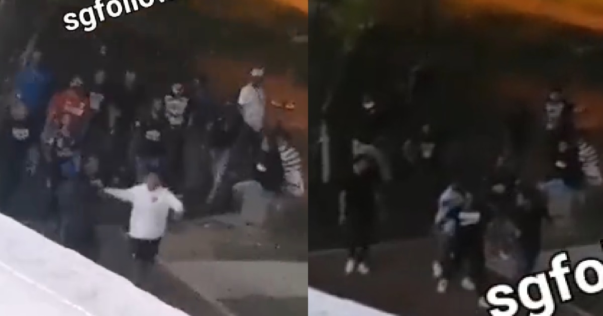 MASSIVE GROUP OF GANGSTERS CLASHING ON SIDE OF ROAD