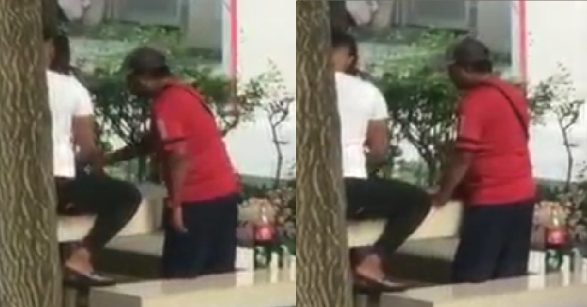 MEN OPENLY DRINKING, SMOKING AND GAMBLING UNDER WALKWAY