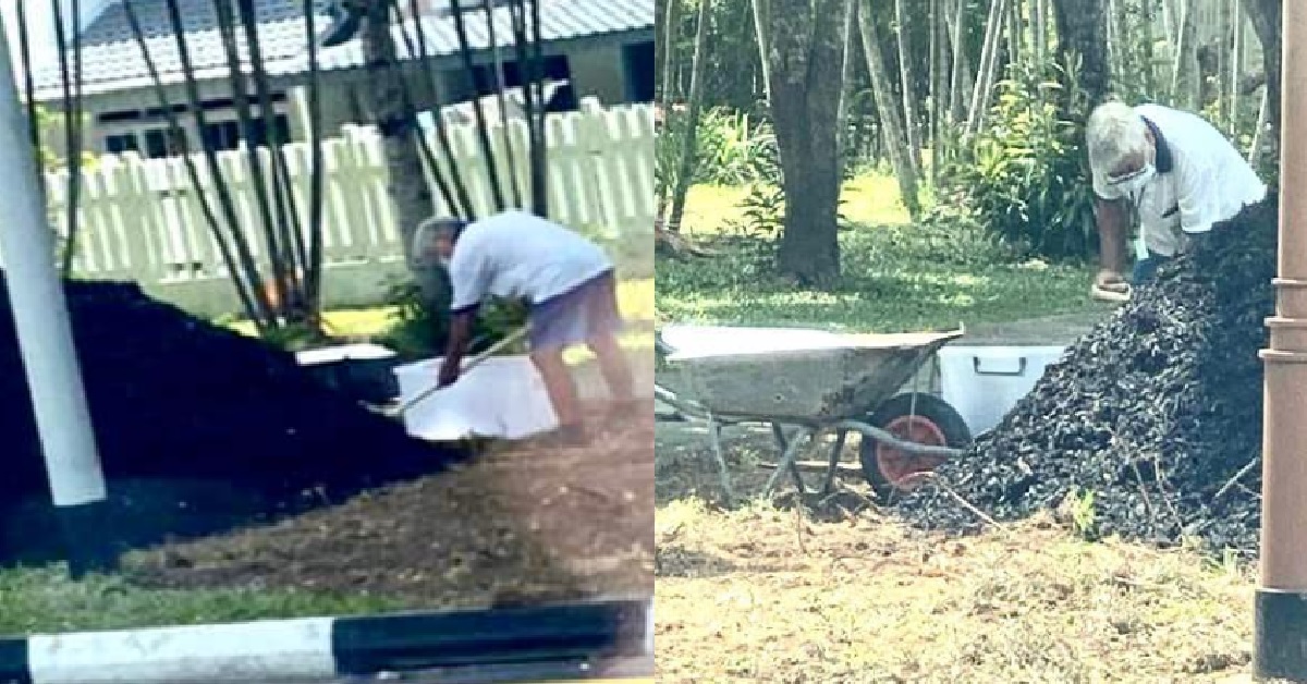 UNCLE DIGGING GROUND BESIDE TRAFFIC LIGHT AND STEALING THE SOIL