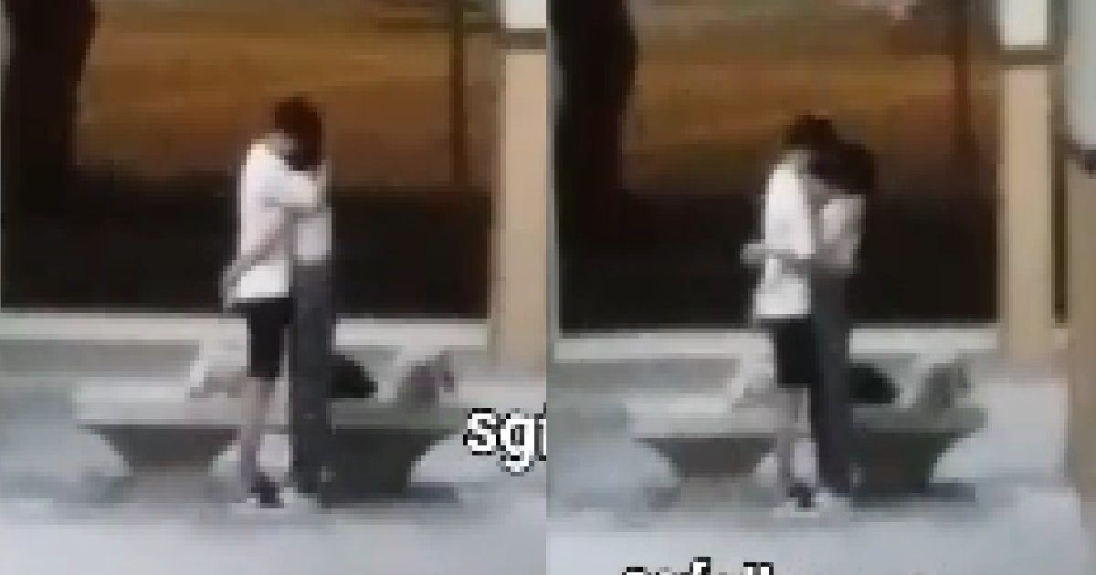 LOVING COUPLE SHARING BODY HEAT AT VOID DECK, PETTING EACH OTHER