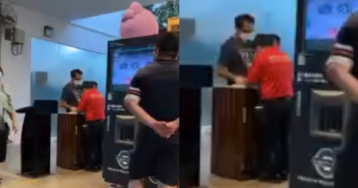 SAFE DISTANCING AMBASSADOR MULTI-TASKING, TAKE ORDER AT COUNTER ALSO