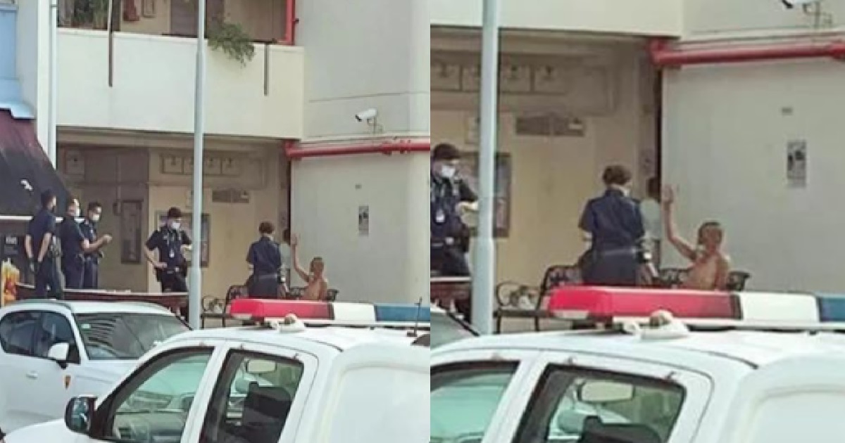 SHIRTLESS AH PEK WALKING AROUND NEIGHBOURHOOD HOLDING 2 KNIVES, ARRESTED