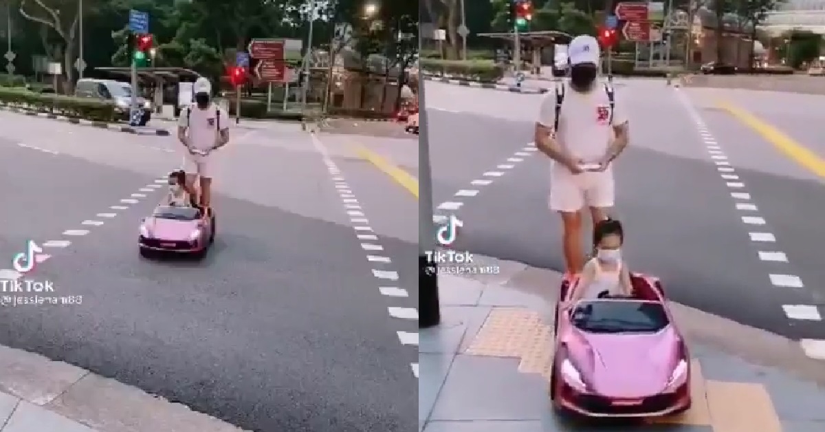 MAN “DRIVE” SMALL GIRL ACROSS ROAD IN REMOTE CONTROL TOY CAR