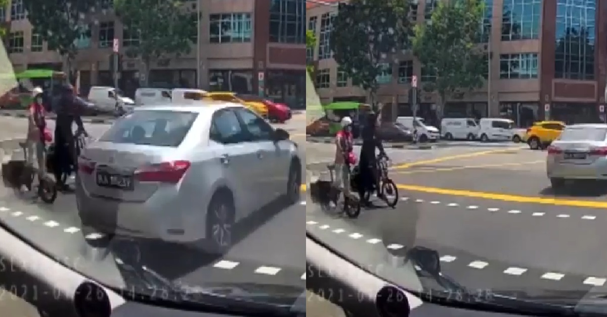 SPEEDING CAR BEAT RED LIGHT, ALMOST KILL TWO CYCLISTS CROSSING ROAD