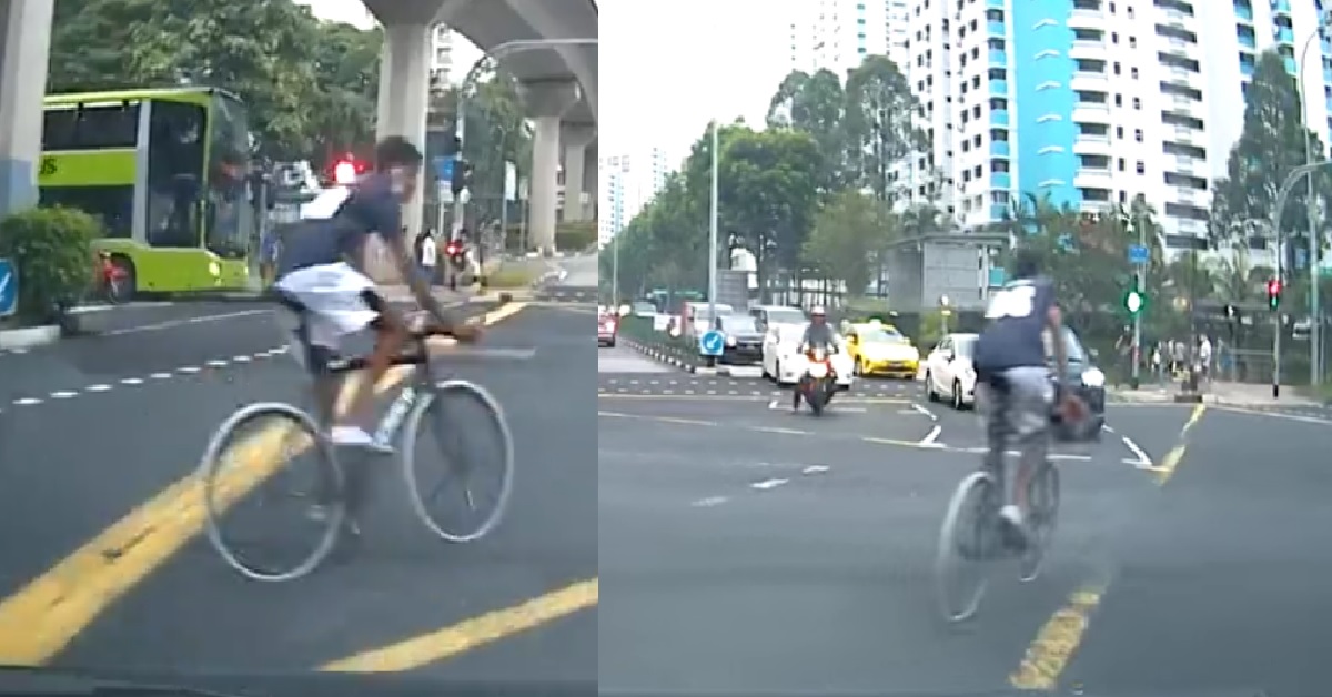YP CYCLES DIAGONALLY ACROSS BUKIT PANJANG JUNCTION LIKE HIS FATHER RD