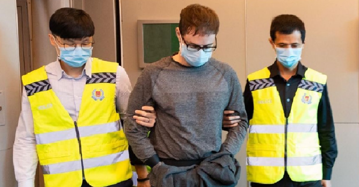 CANADIAN MAN WHO ROBBED  BANK IN SG GETS 5 YEARS & 6 STROKES OF ROTAN
