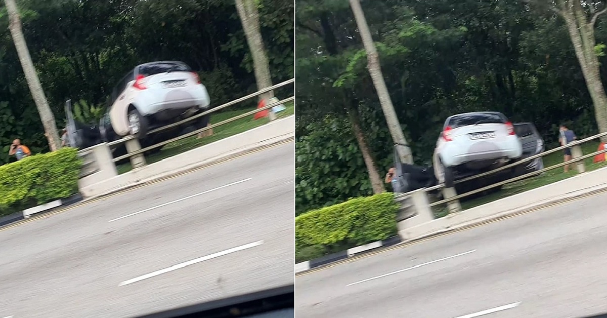 CAR FLIES OVER BARRICADE AT ADAM FLYOVER, FLYOVER INDEED