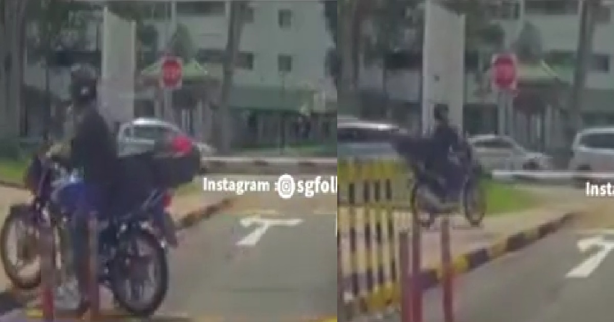 MOTORCYCLIST RIDE AROUND CARPARK GANTRY TO SIAM PARKING FEE