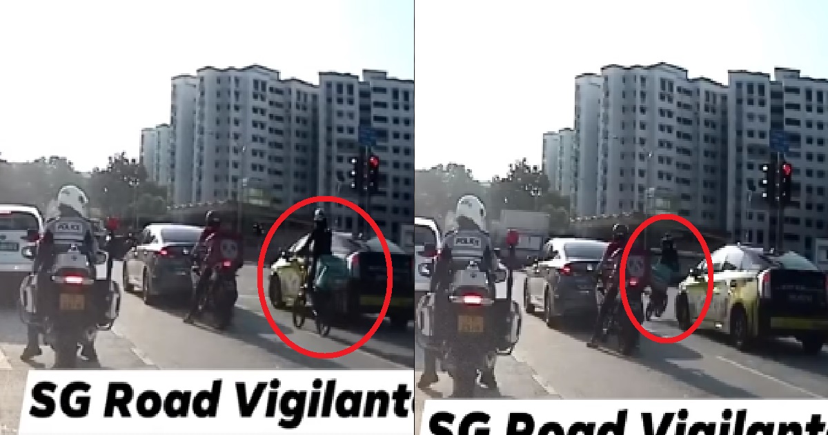 CYCLIST BEAT RED LIGHT IN FRONT OF TRAFFIC POLICE @ WOODLANDS