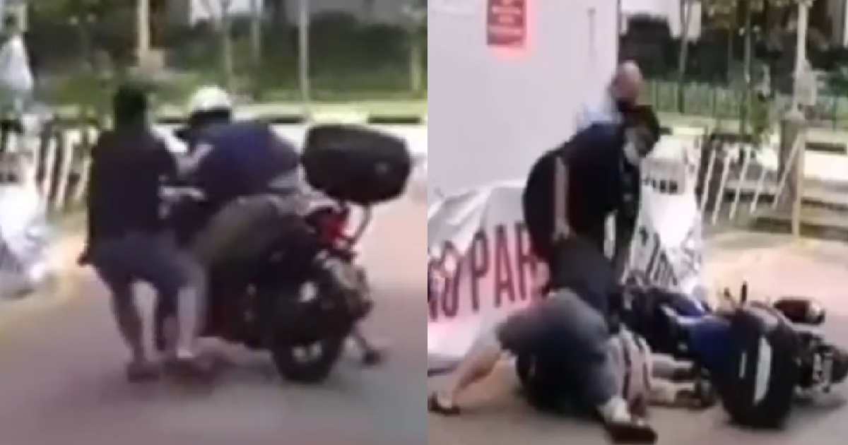 MOTORCYCLIST KENA TACKLED OFF BIKE AFTER TRYING TO RIDE AWAY FROM FIGHT
