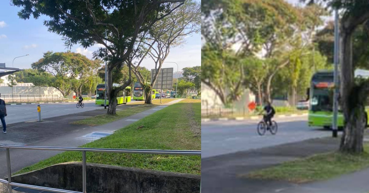BICYCLE BLOCKS BUS AND DELAYS TRAFFIC