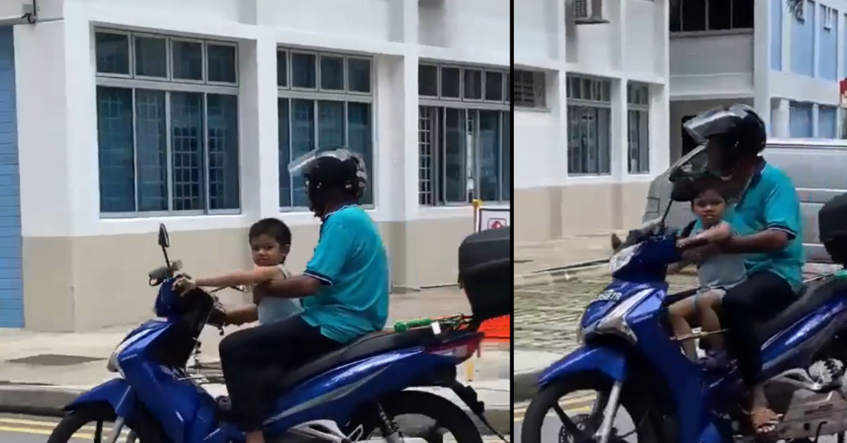 MAN RIDES MOTORBIKE WITH CHILD WITH NO HELMET AT SERANGOON