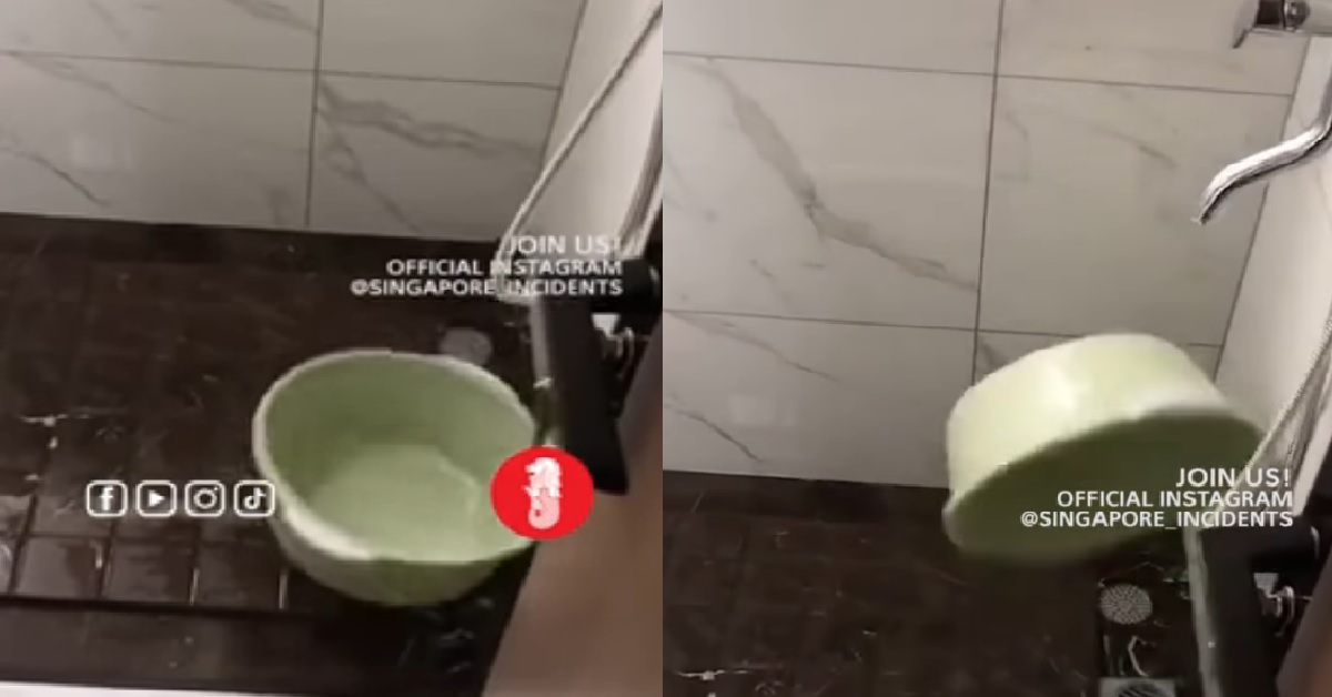 FIRST DAY OF HUNGRY GHOST MONTH, BUCKET MOVING BY ITSELF @ TOILET