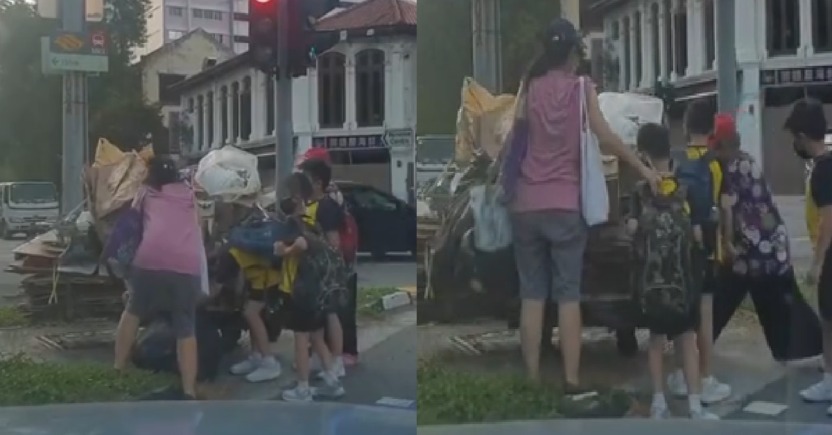 KIND-HEARTED KIDS HELPING CARDBOARD AH MA WITH HER TROLLEY