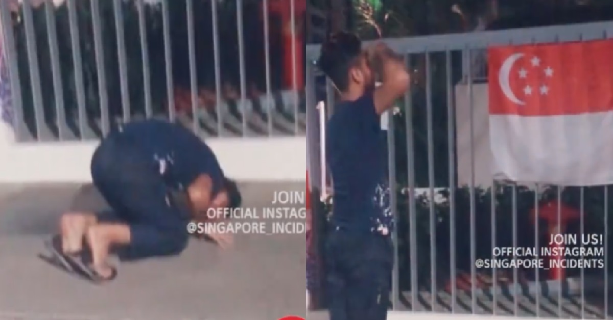 GUY BOW DOWN AND SALUTE IN FRONT OF S’PORE FLAG TO SHOW RESPECT