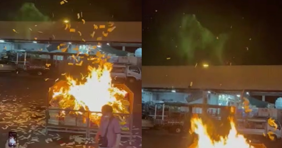 GREEN FIGURE CAPTURED ABOVE HUNGRY GHOST MONTH OFFERINGS