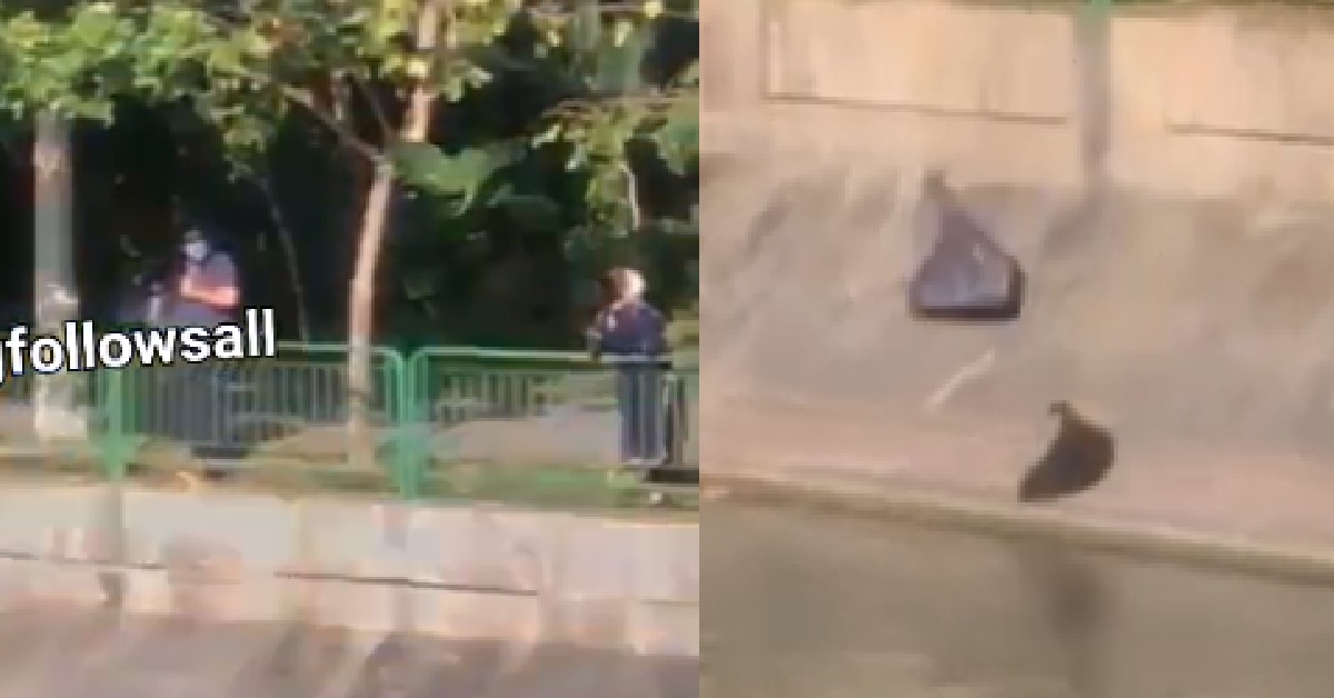 RUBBISH COUPLE THROW RUBBISH INTO RIVER, WALK AWAY LIKE NOTHING HAPPENED