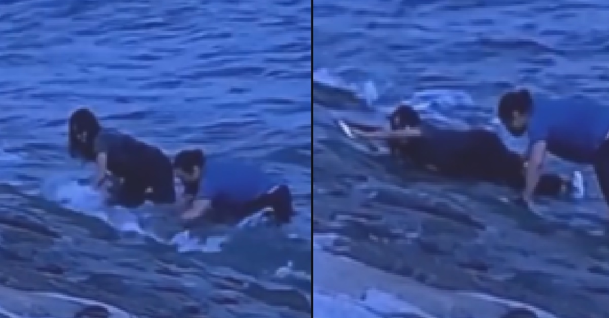 GUY TRY TO SAVE GIRL FROM SLIPPERY SLOPE @ BEACH, FALL INTO WATER INSTEAD