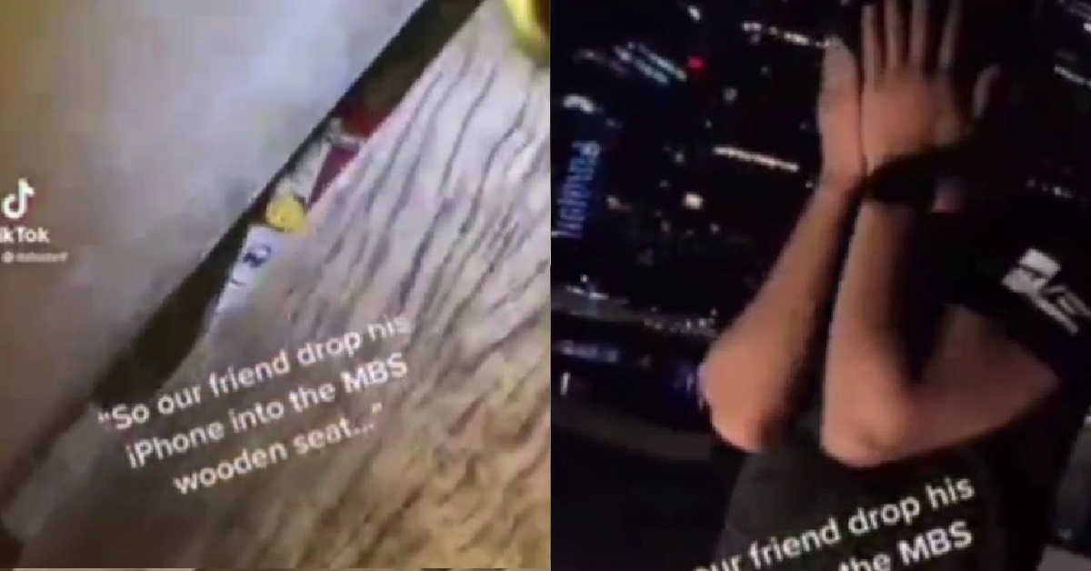 GUY DROP HIS IPHONE INTO GAP OF WOODEN SEAT, CANNOT GET IT OUT