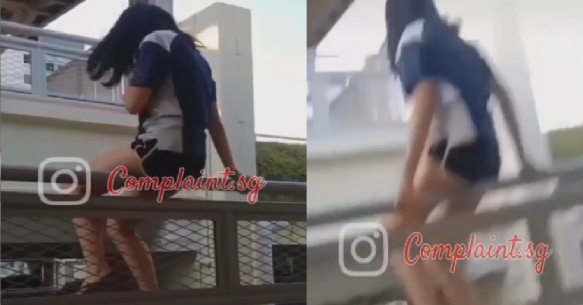 XMM SITTING DANGEROUSLY ON LEDGE OF CARPARK RAILING