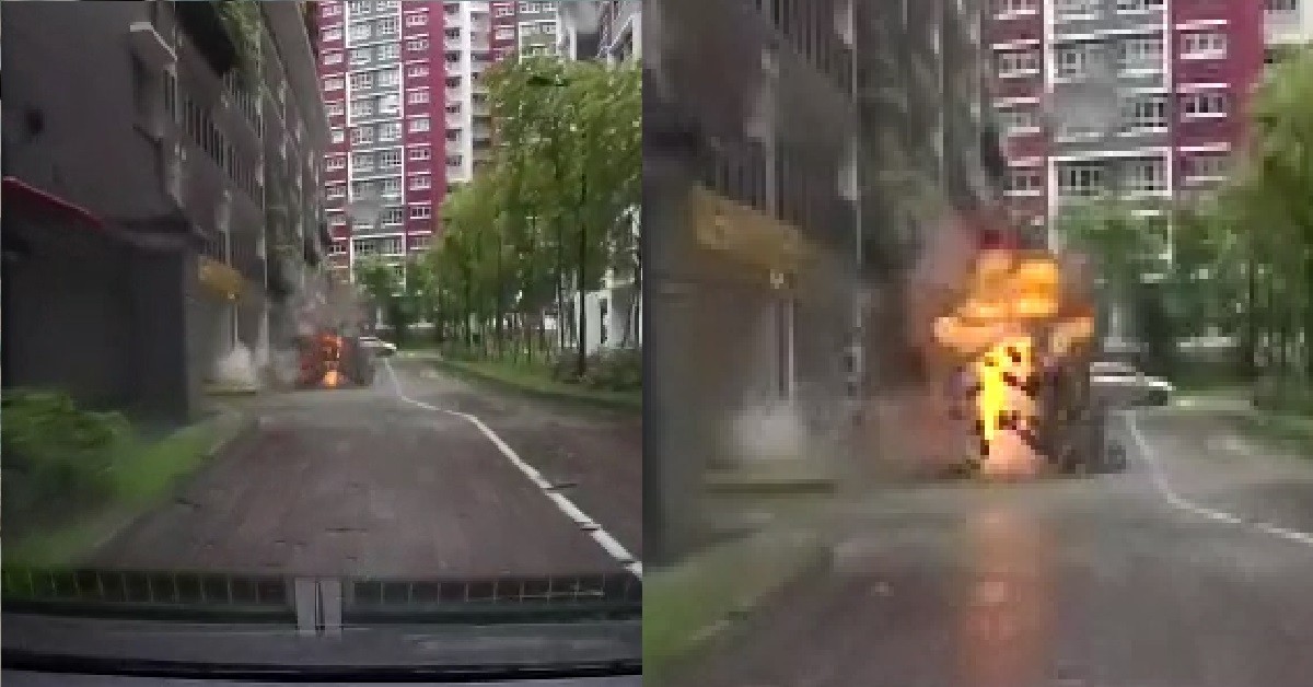 LIGHTNING STRIKES CONCRETE RIGHT IN FRONT OF DRIVER TURNING INTO CARPARK