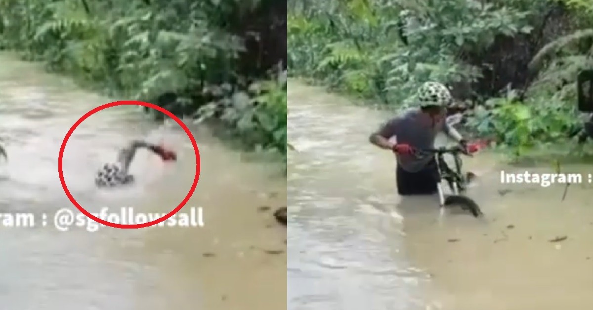 HIKING TRAIL FLOODED, SO CYCLIST DECIDE TO SWIM IN THE MUDDY WATER INSTEAD