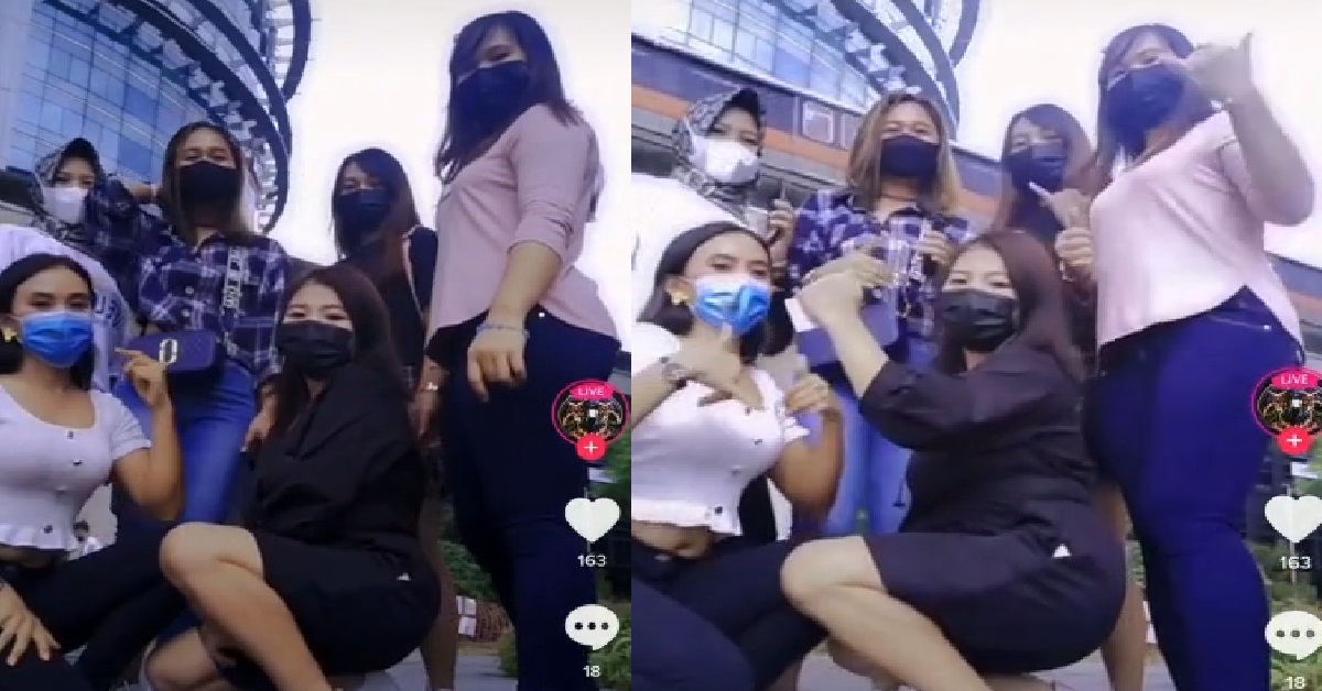 MAIDS ILLEGALLY GATHERING IN GROUP OF 6 TO DANCE UNDER MRT