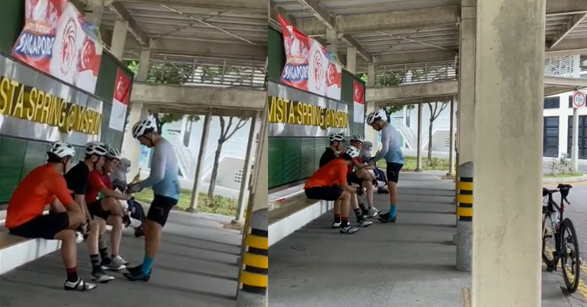 TOUR DE FRANCE GROUP NO WEAR MASK CHIT CHAT AT BUS STOP