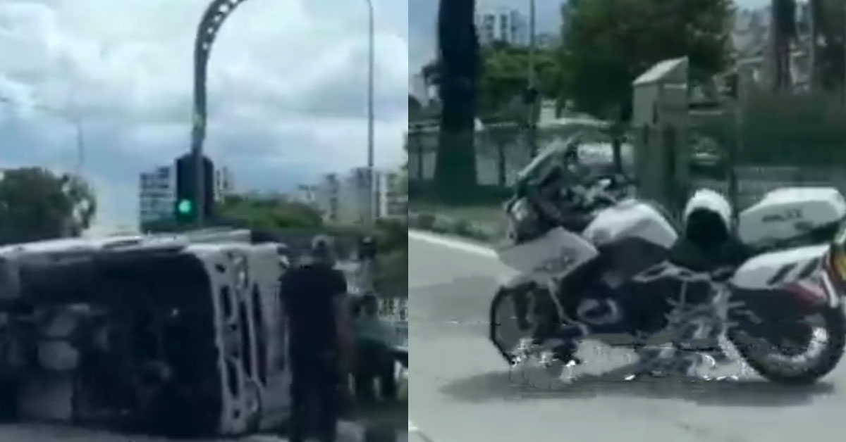 ACCIDENT AT BEDOK, REFRIGERATE TRUCK FLIPS AND LANDS ON DIVIDER