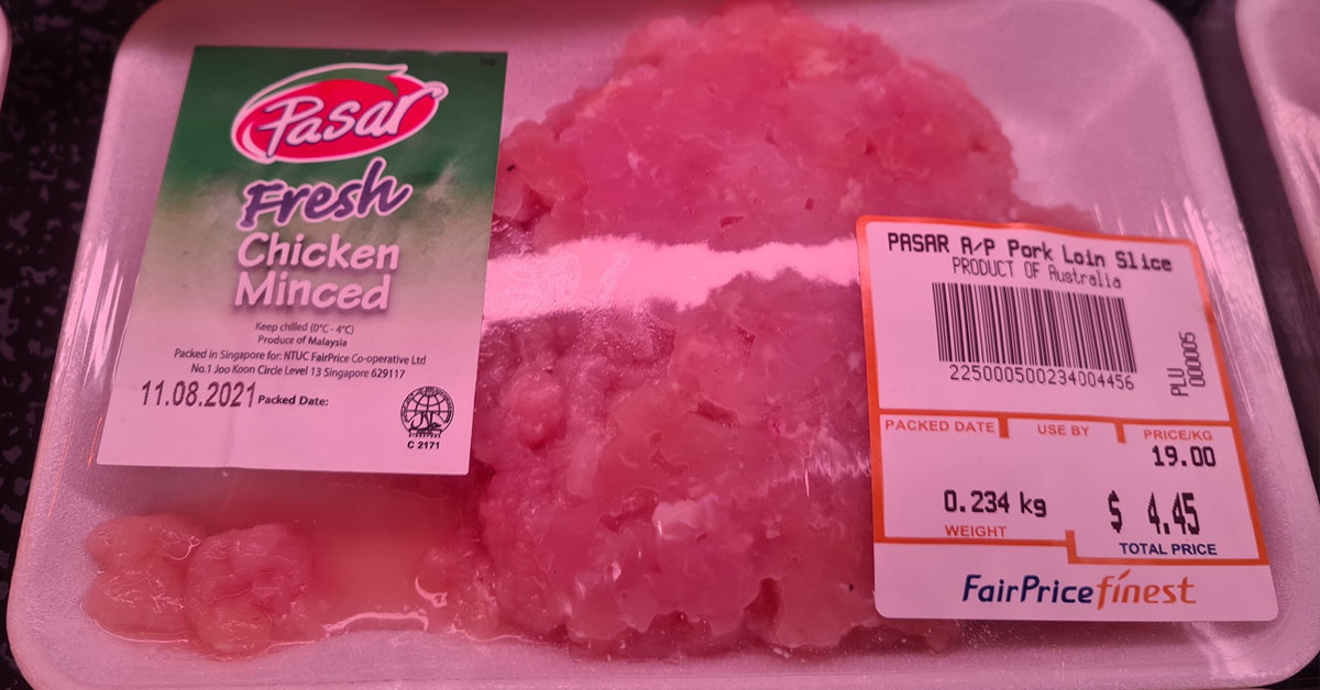 FAIRPRICE AT PAYA LEBAR QUARTERS MIX UP CHICKEN & PORK LABELS