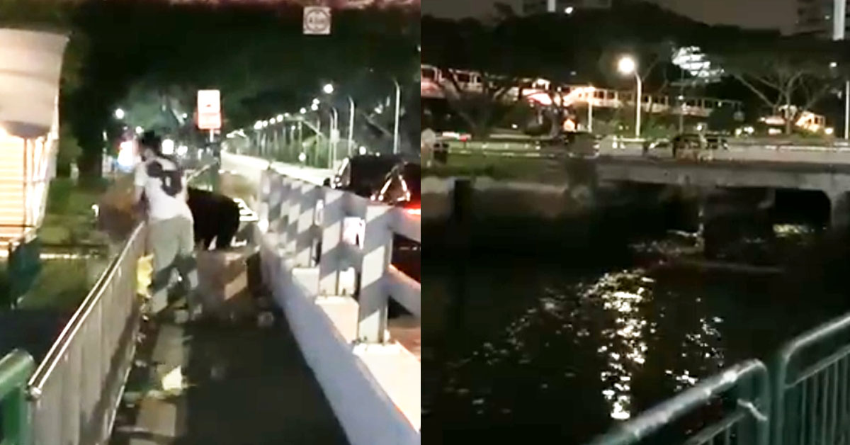 MEN THROWING BOXES OF PAPER OFFERING INTO CANAL