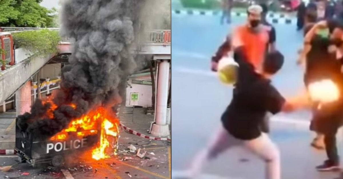 RIOT IN BANGKOK, POLICE CAR BURNS DOWN. RUBBER BULLETS SHOT