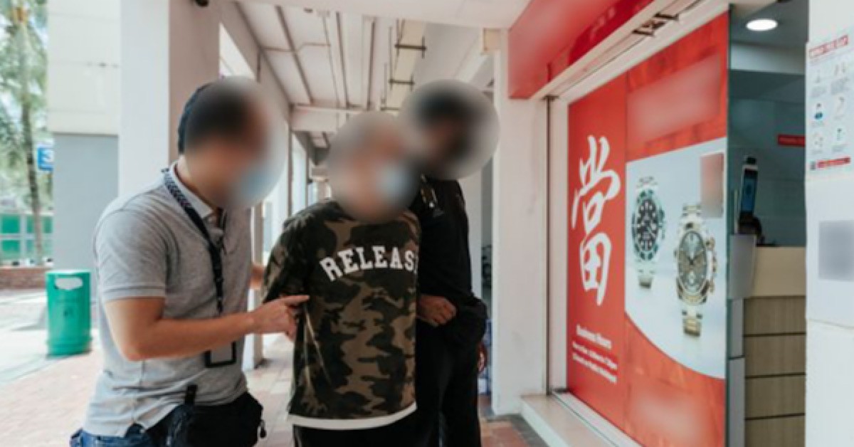 46 Y.O MSIAN MAN ARRESTED FOR ARMED ROBBERY AT WOODLANDS PAWNSHOP