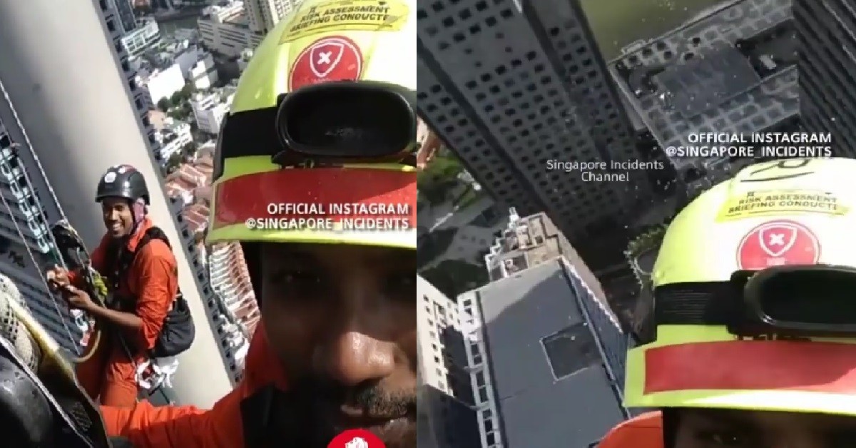 FEARLESS MIGRANT WORKER HANGING FROM TOP OF SKYSCRAPER, SELFIE